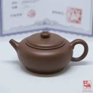 Da Bing Round Knob Flat Pot <br>大彬圆钮扁壶